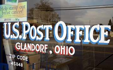 Post office signage in downtown Glandorf, Ohio, which draws water from the Blanchard River via an intake reservoir